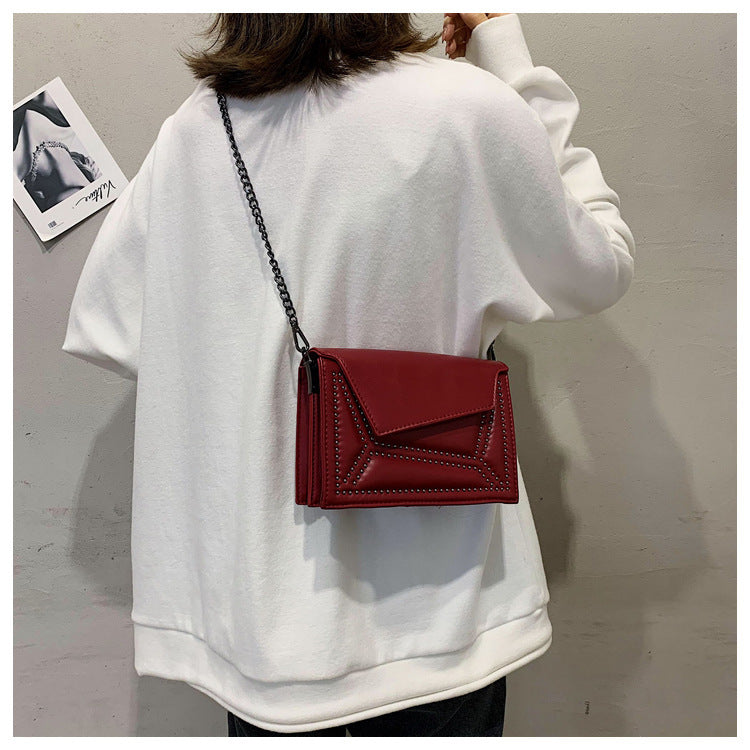 Cross-body rivet bag for lady