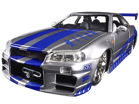 Brian's Nissan GTR Skyline R34 RHD (Right Hand Drive) Silver with Blue Stripes "Fast & Furious" Movie 1/24 Diecast Model Car by Jada