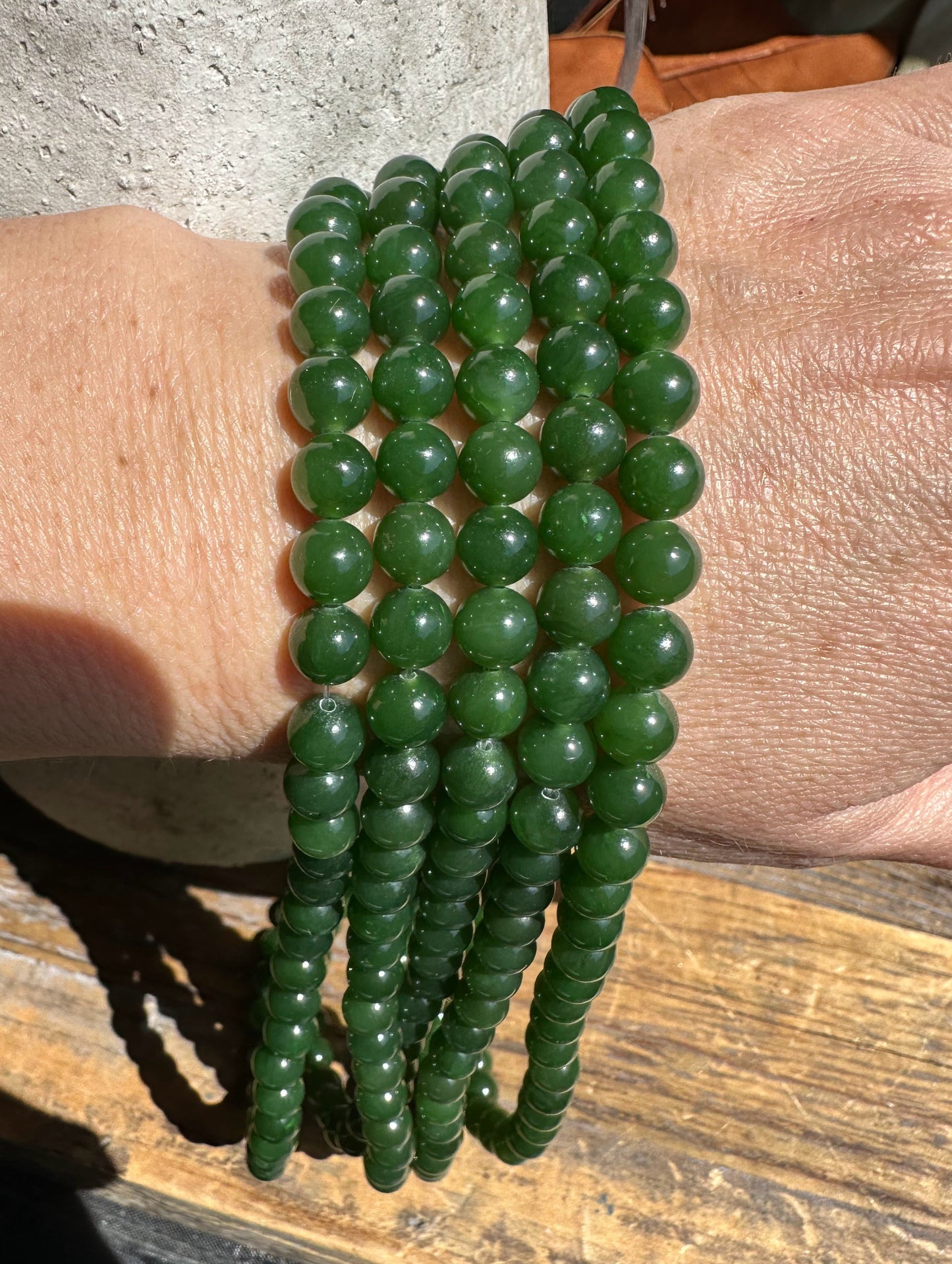 A Grade 7mm Nephrite Jade Beads, unstrung 16"