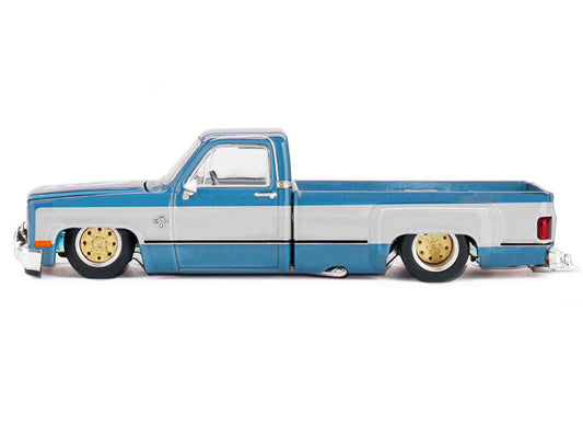Chevrolet Silverado Dually Pickup Truck "Vintage Spec V1" Light Blue Metallic with White Sides and Interior (Designed by Jun Imai) "Kaido House" Special 1/64 Diecast Model Car by Mini GT