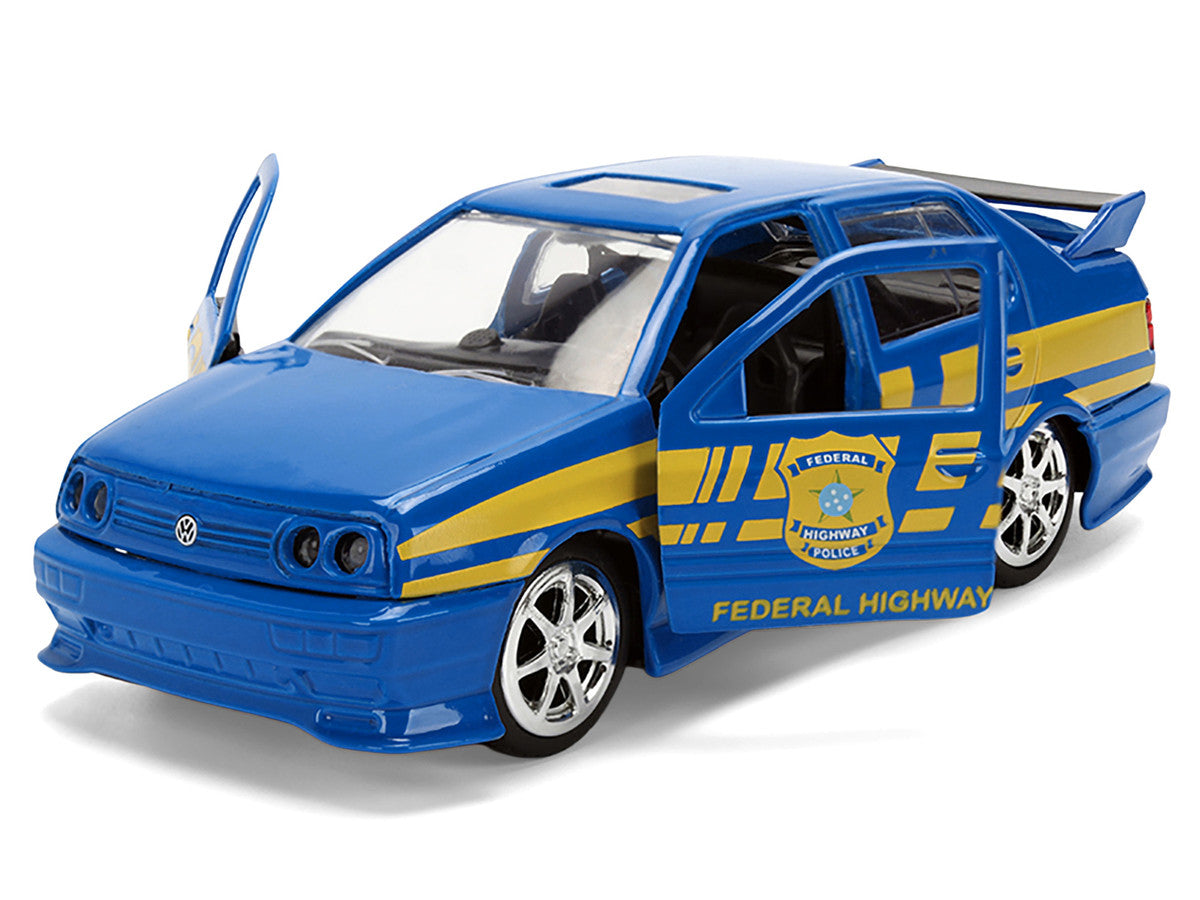Volkswagen Jetta Police Vehicle "Rio Federal Highway Police" Blue with Yellow Stripes "Fast Five" (2011) Movie "Fast & Furious" Series 1/32 Diecast Model Car by Jada