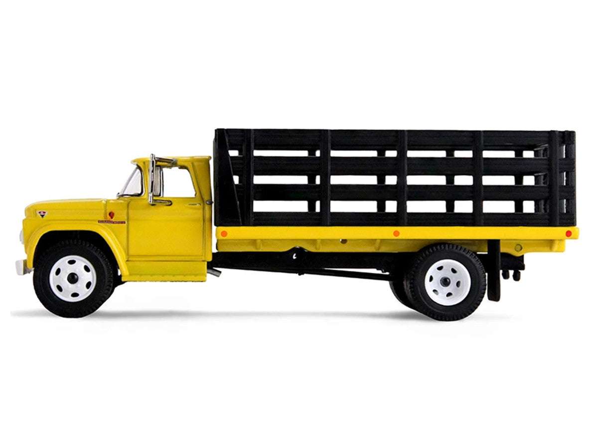 GMC 4000 Stake Truck Bright Yellow 1/64 Diecast Model by DCP/First Gear