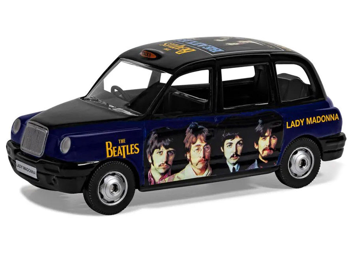 The Beatles London Taxi RHD (Right Hand Drive) "Lady Madonna" Black and Dark Blue with Graphics Diecast Model by Corgi