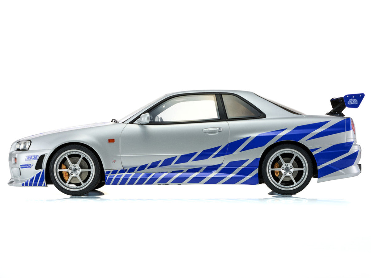 Nissan Skyline GT-R (R34) RHD (Right Hand Drive) Silver Metallic with Blue Graphics "2 Fast 2 Furious" (2003) Movie 1/12 Model Car by Kyosho