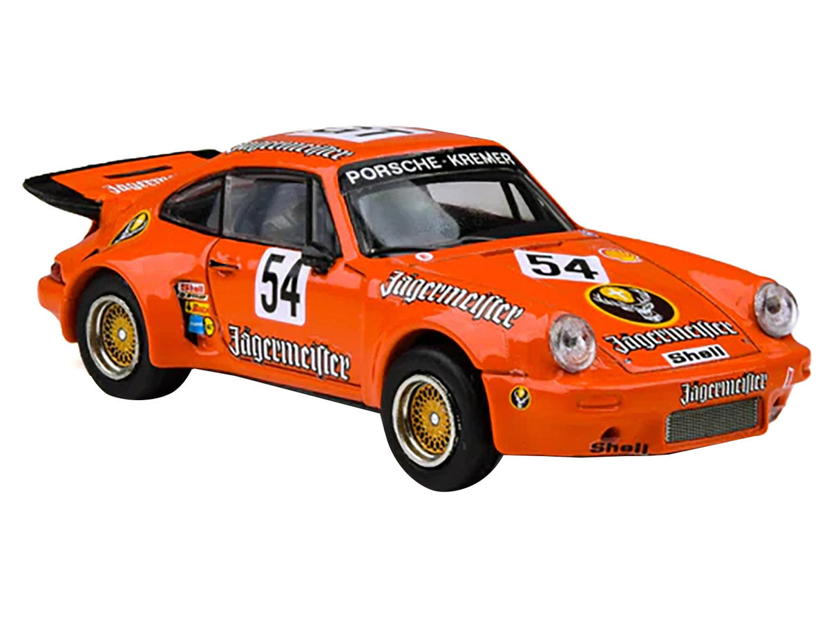 Porsche 911 Carrera RSR 3.0 #54 "Jaegermeister - Kremer" Orange 1/64 Diecast Model Car by Paragon Models