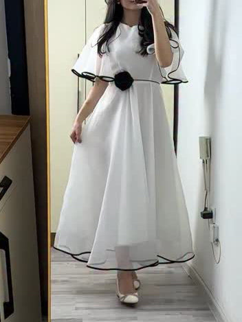 White Chiffon Maxi Dress With Black Trim And Floral Accent