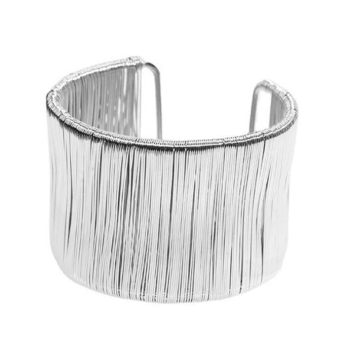 Handcrafted Gold-plated Geometric Cuff Bracelets And Boho-chic Metal Tassel Arm Rings With Vintage-inspired Exaggerated Water Drop Designs, Offering Unisex Luxury Accessories In Open Bangle Styles
